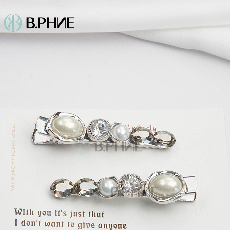 B.【贝菲】简约优雅设计师圆珠压夹时尚百搭