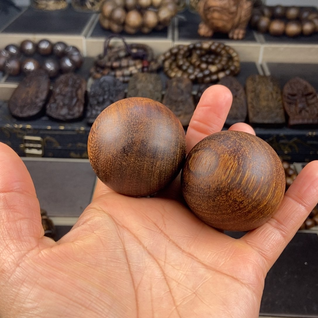 沉香木手把件天**星越南芽庄白棋