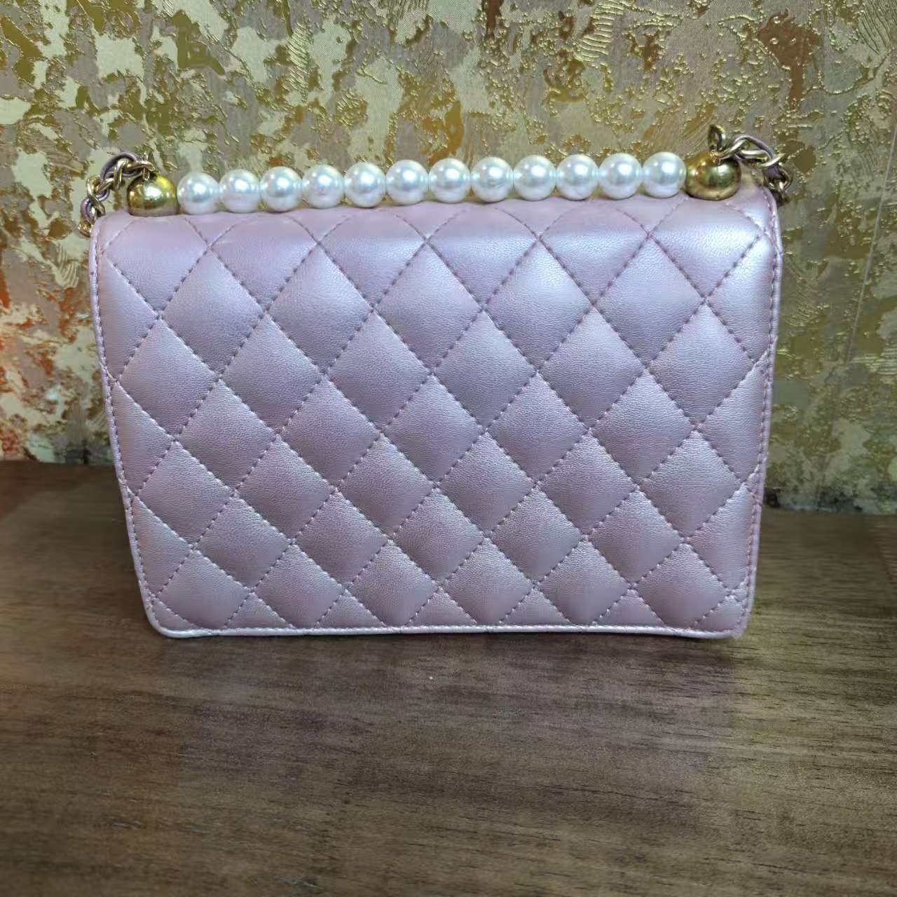 24年秋冬新款真皮重工女包横珍珠10511