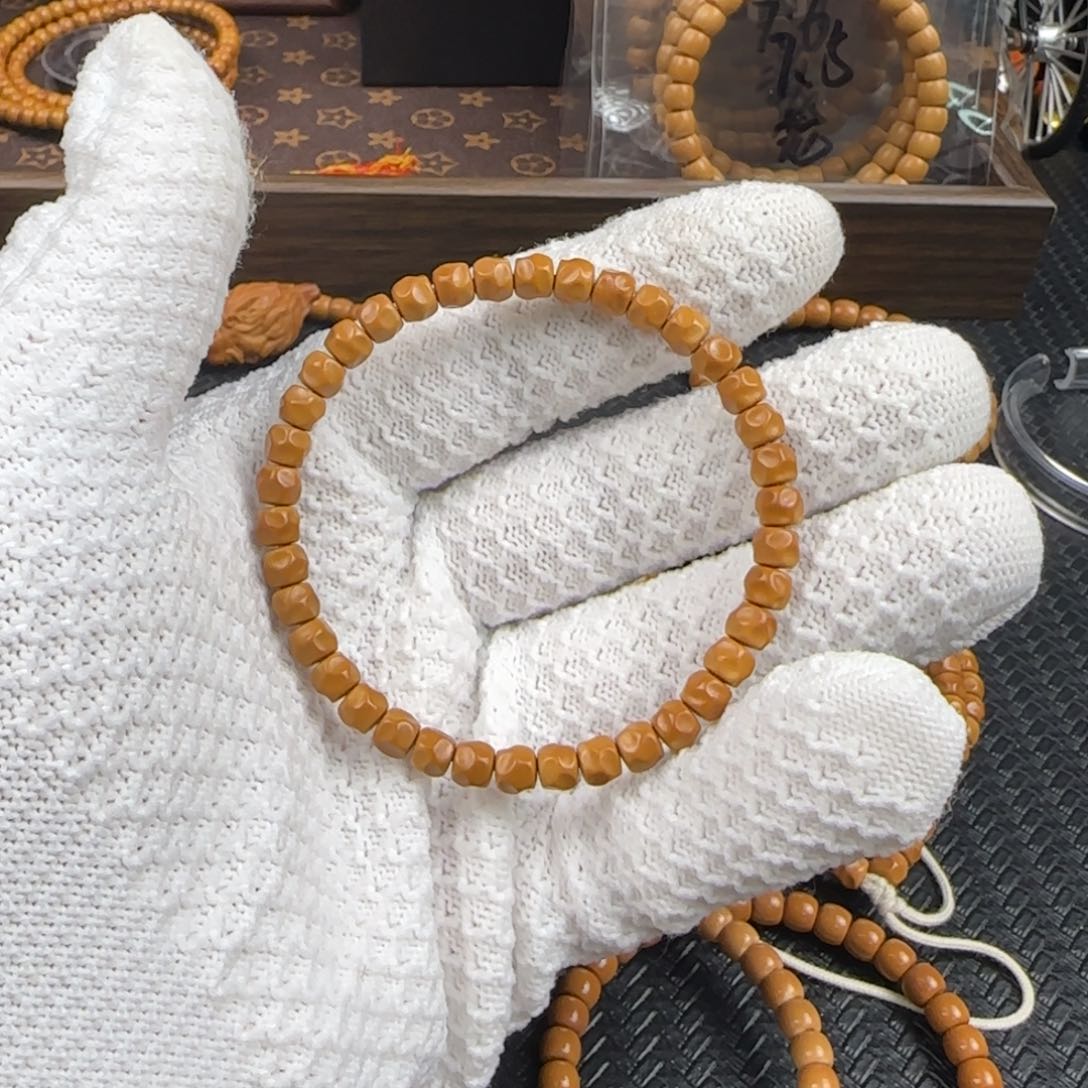 橄榄核吊坠超s级6.1mm老挝核尖无相单圈