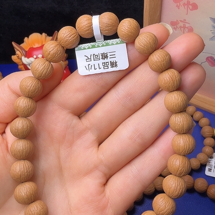 用***0猴头核桃吊坠凤羽
