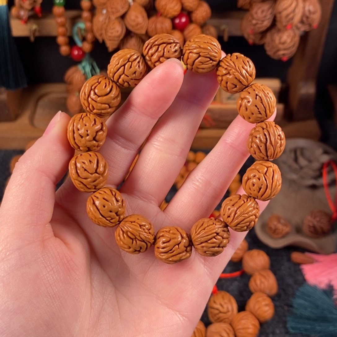 吊坠桃核桃枭手串