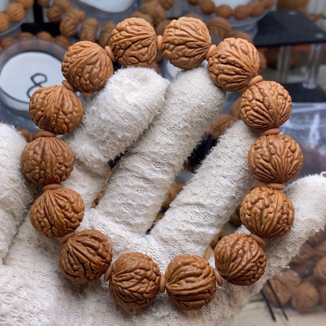 桃核把件精品荔枝纹