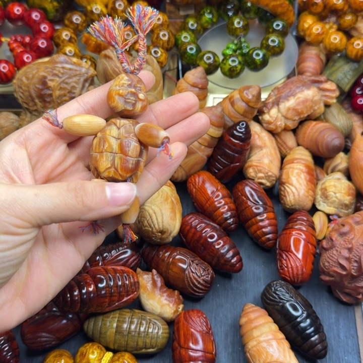 松木琥珀木文玩把