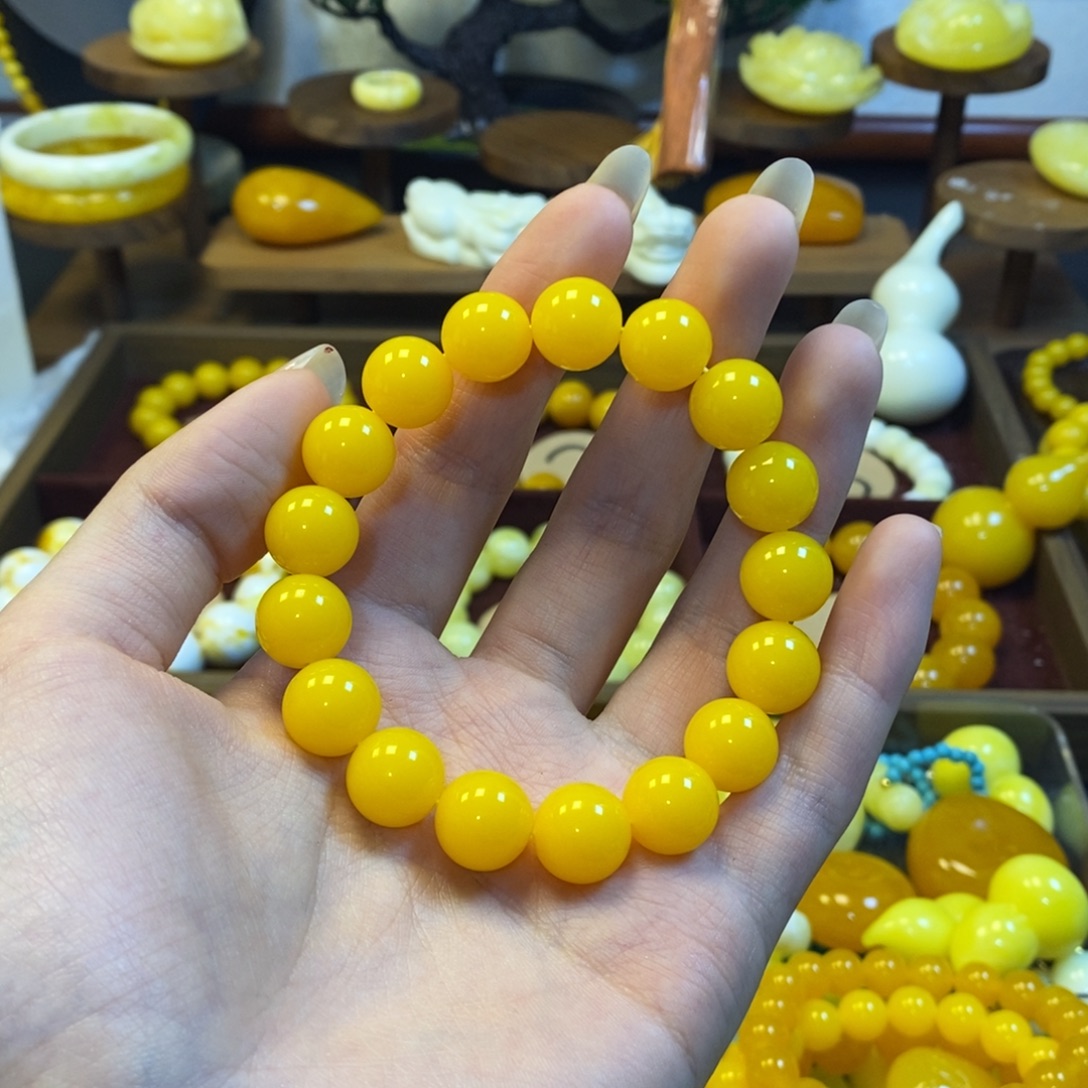 H***M鸡油黄满蜜卡12手串一条