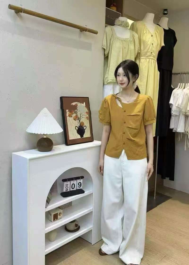 滨莉家 时尚镂空圆领拼接压褶设计感上衣