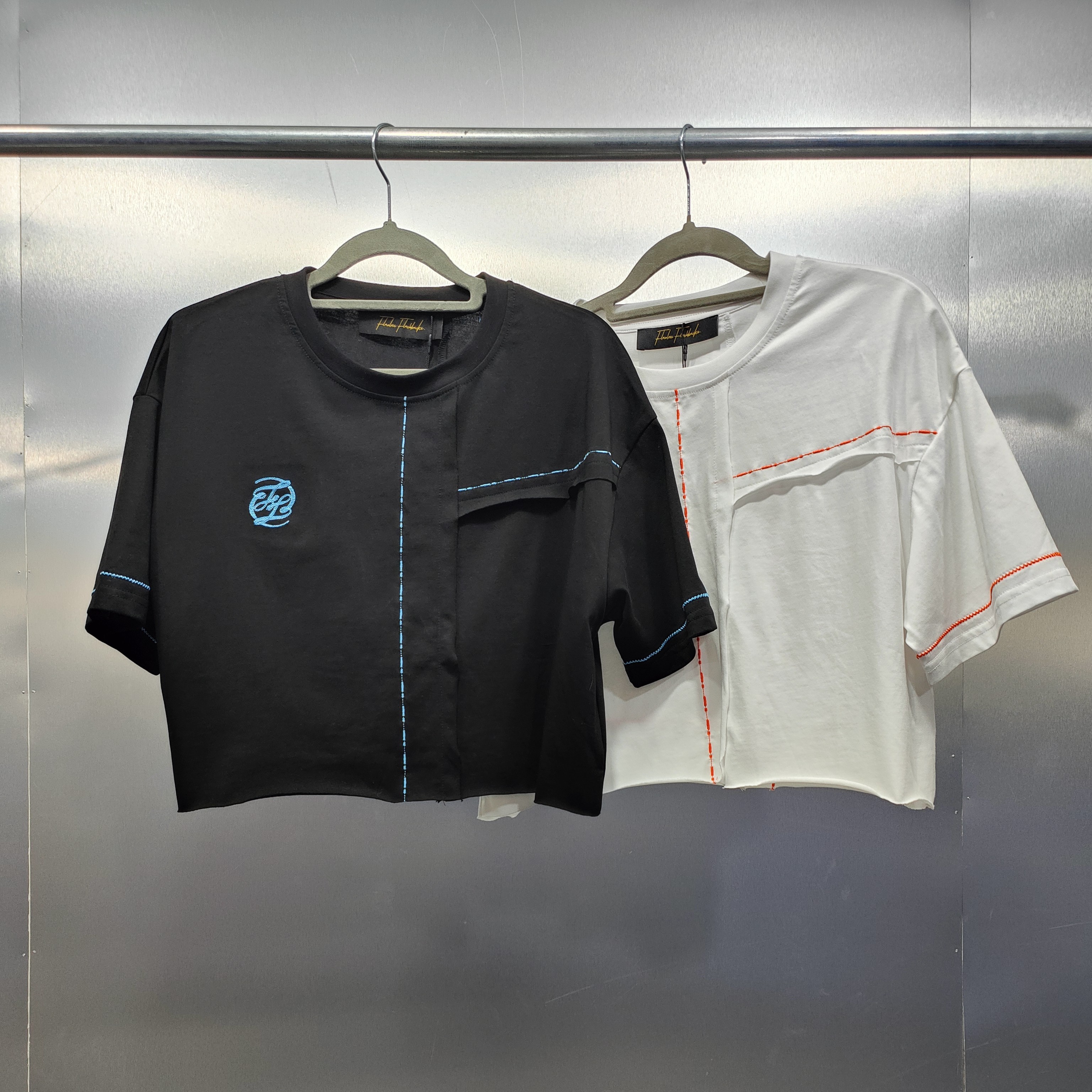 F05-21553-FBF夏季明线破洞拼接设计时尚圆领T半袖