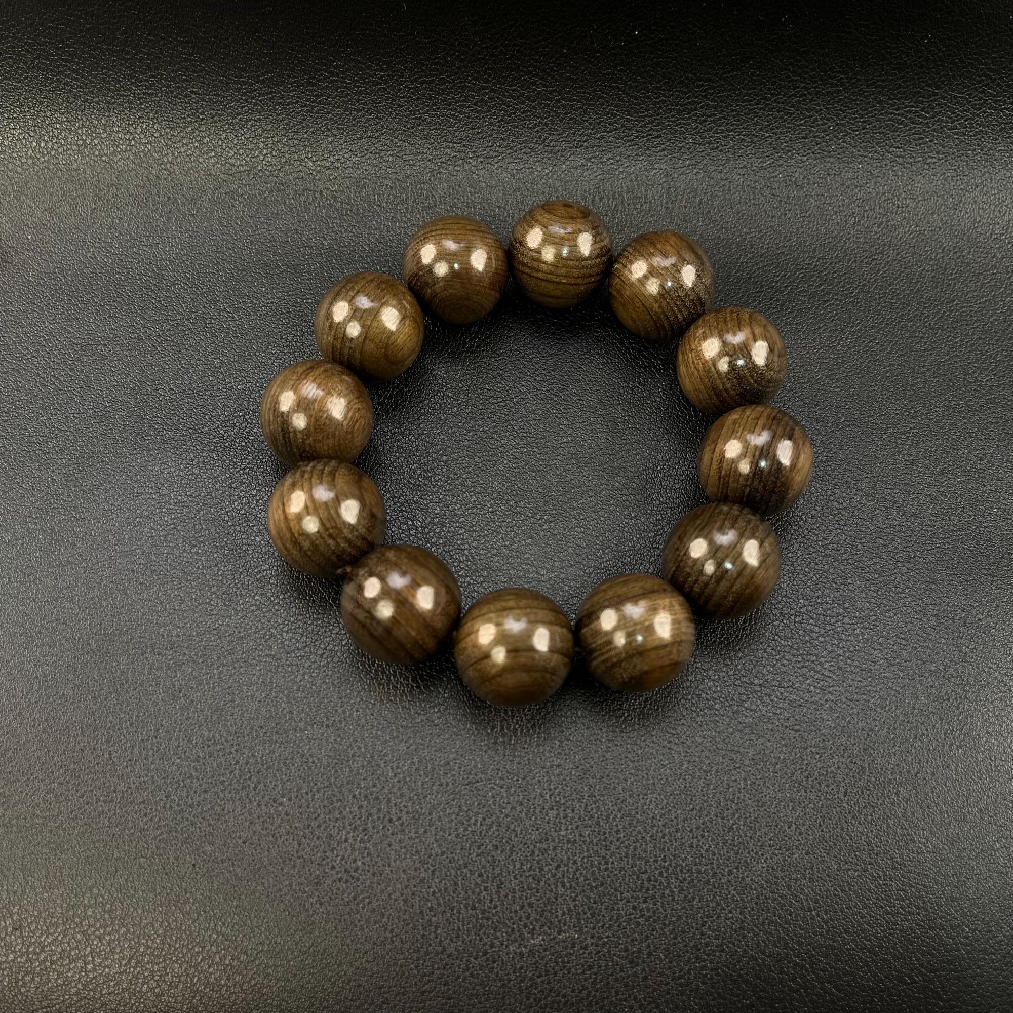 阴沉木2.0*12颗手串