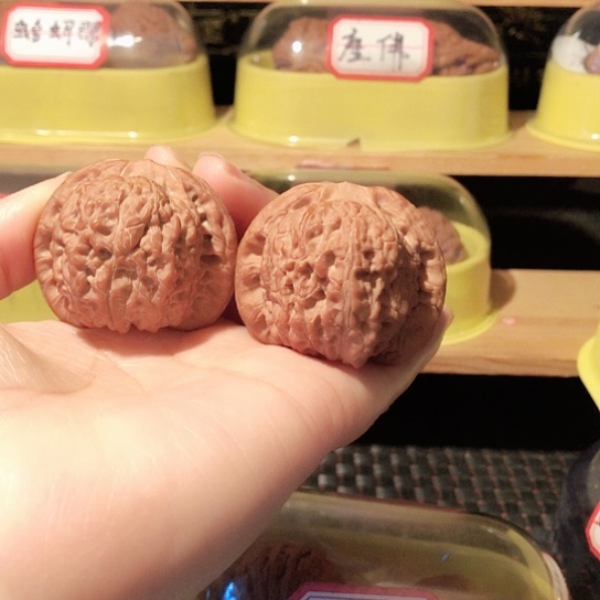 白*光文玩核桃把件血麒麟