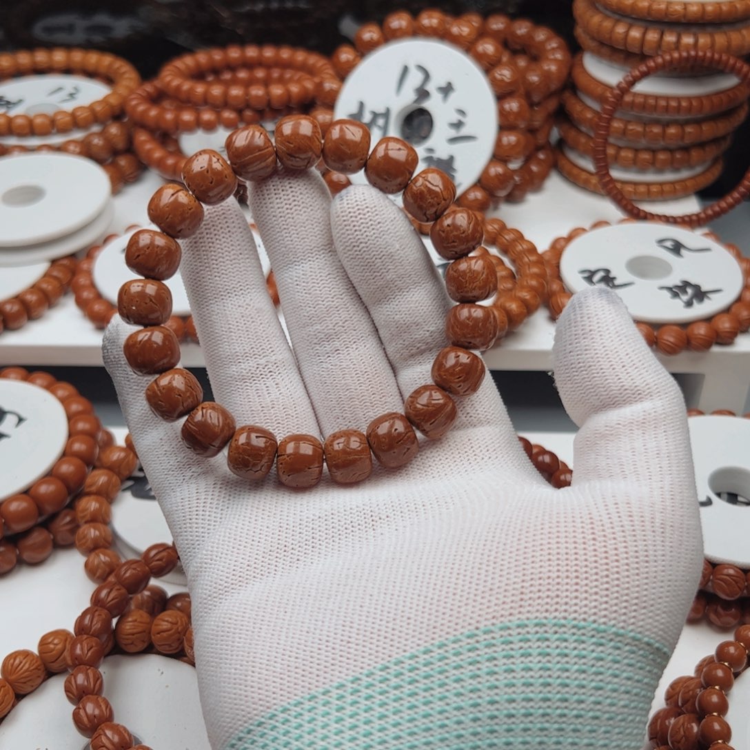 L***鑫吊坠桃核桃核手串