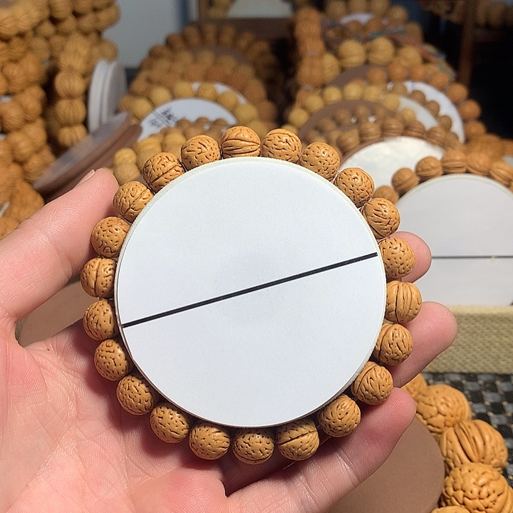 追***里手串桃核9#密纹金豆