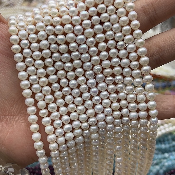 未镶嵌玛瑙/玉髓珠宝半成品一条5.5mm左右椭圆珍珠有生长纹