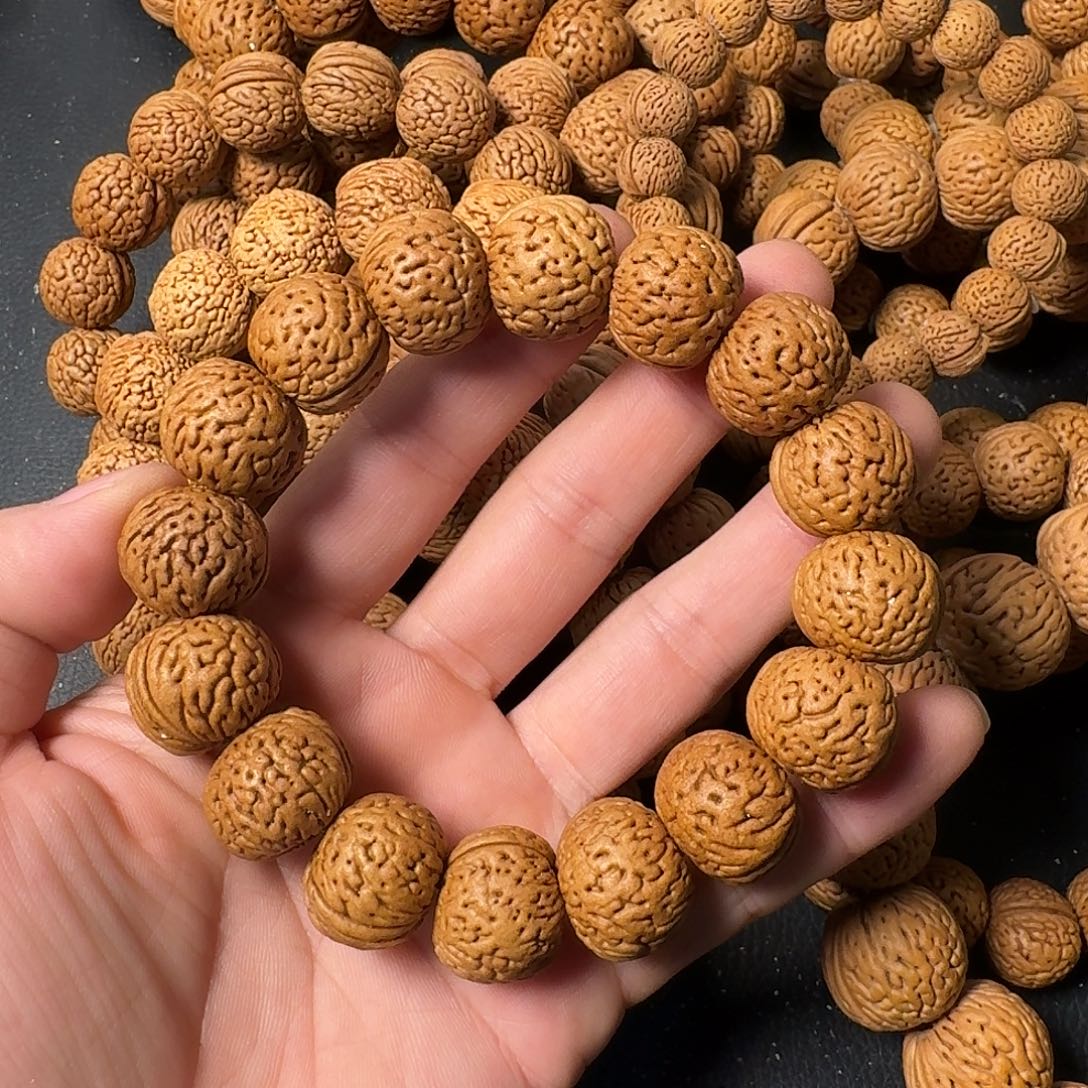 赶***人桃核吊坠苹果园手串