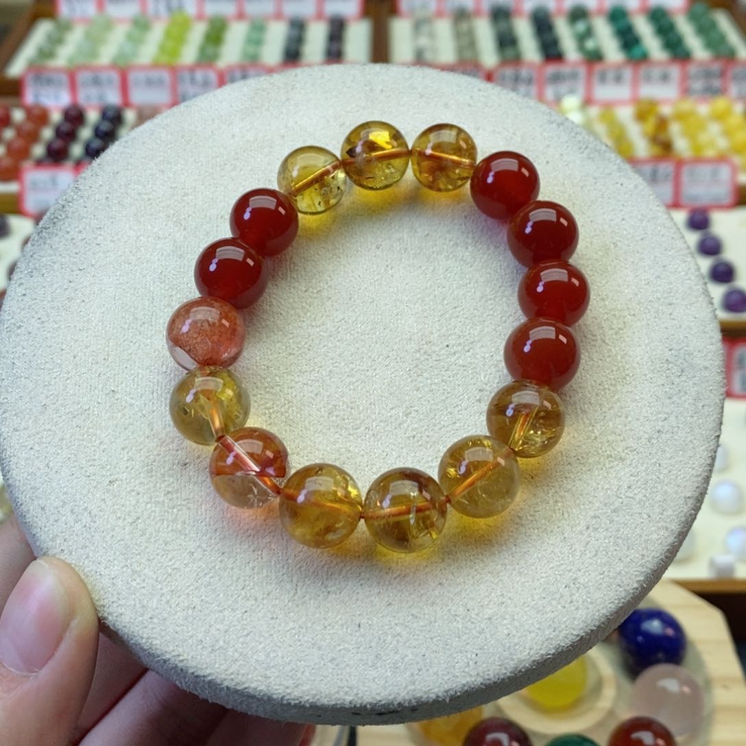 未镶嵌手串水晶拍两单是一串的价格，默认有瑕疵