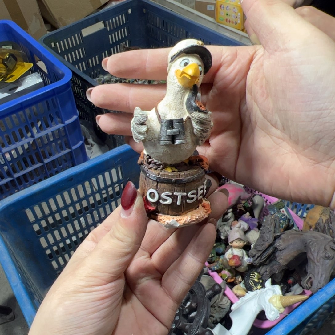 潇***洁陶瓷树脂工艺品摆件