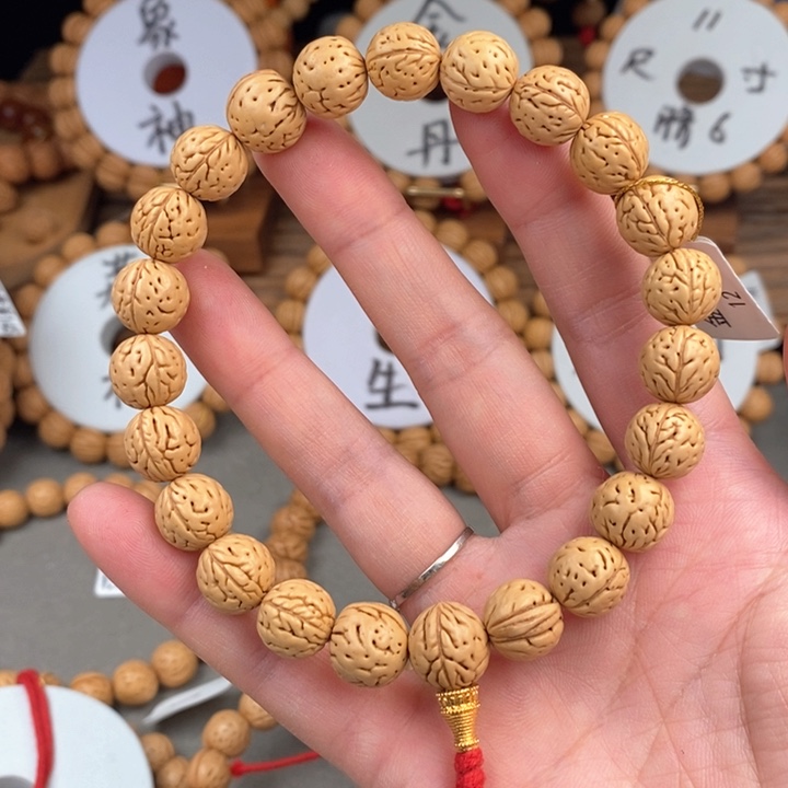 桃核手串A****姐金豆12抛光板尺寸误差0.5之间