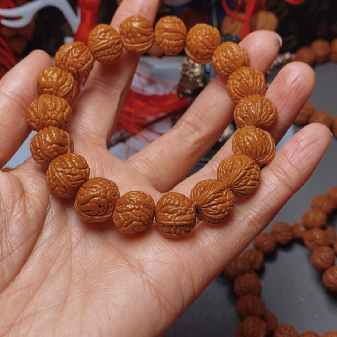 伊***东桃核吊坠桃枭手串1