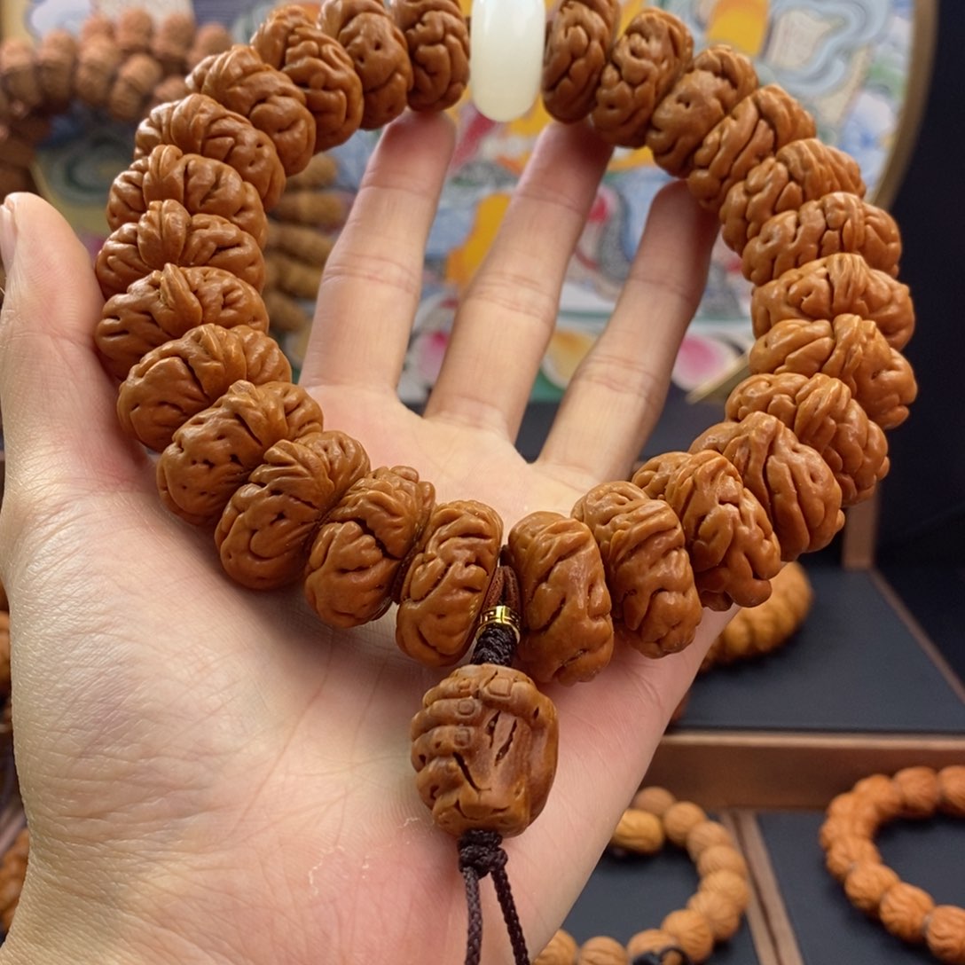 桃核手串思*龙纹桃核白玉龙