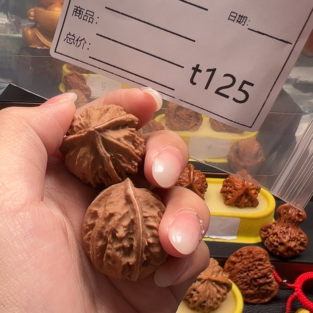 赚****文玩核桃手把件三棱