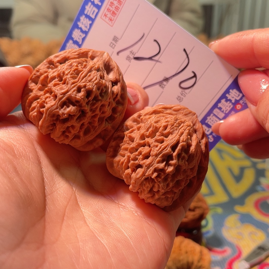 我***蒜核桃把件38左右全品三角红皮涿鹿南将石