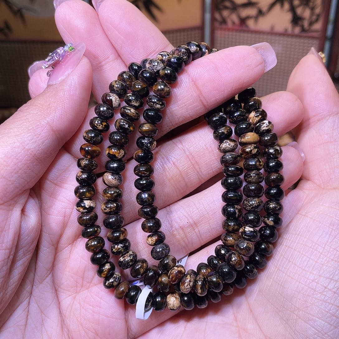 猫***仙琥珀未镶嵌裸石抚顺琥珀6+黑花翳王