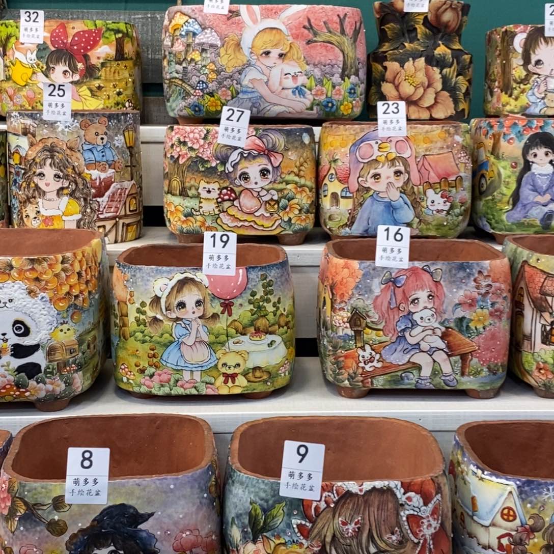 婲****萌多多手绘花盆的设计