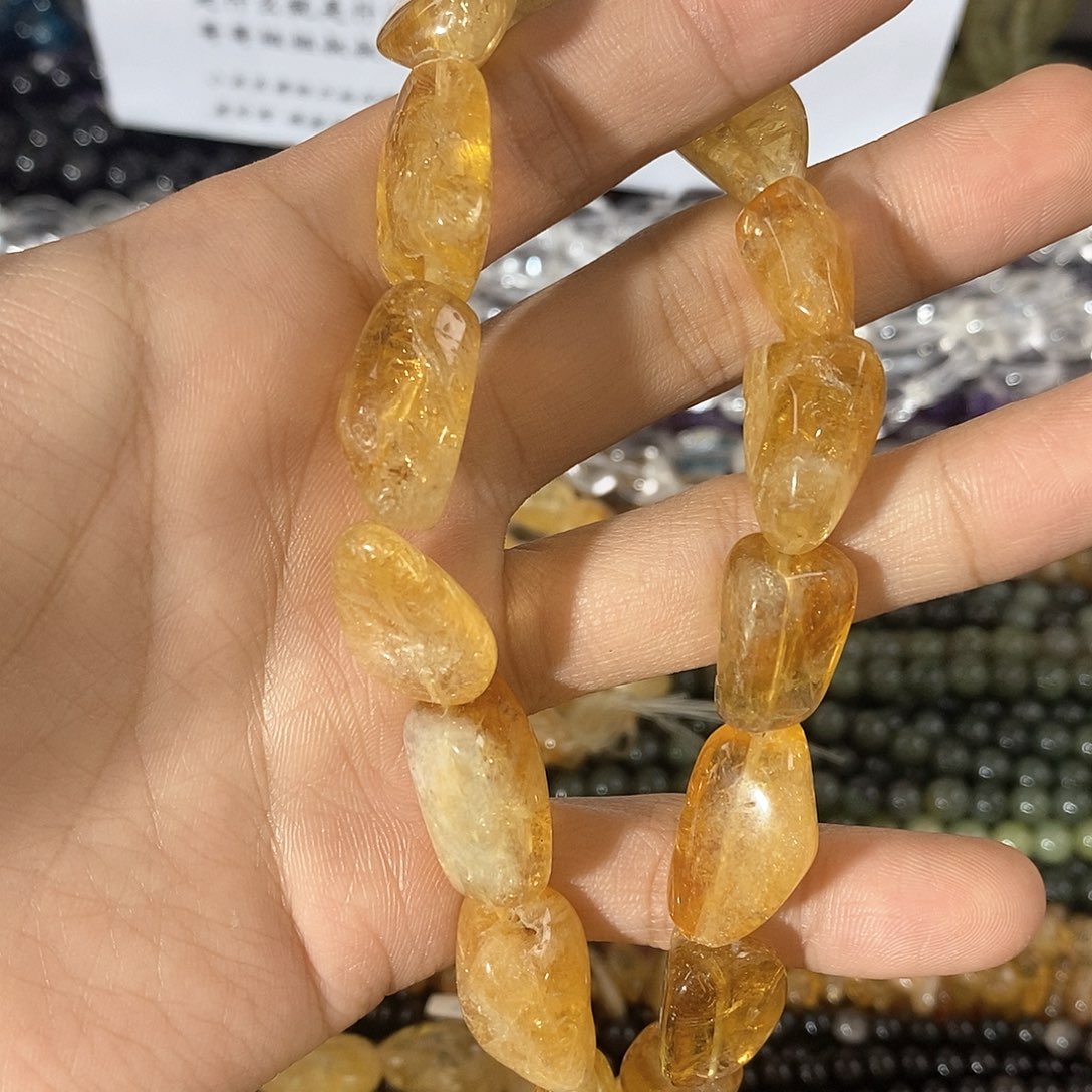 玛瑙/玉髓珠宝半成品未镶嵌j****5一条天然黄水晶不规则