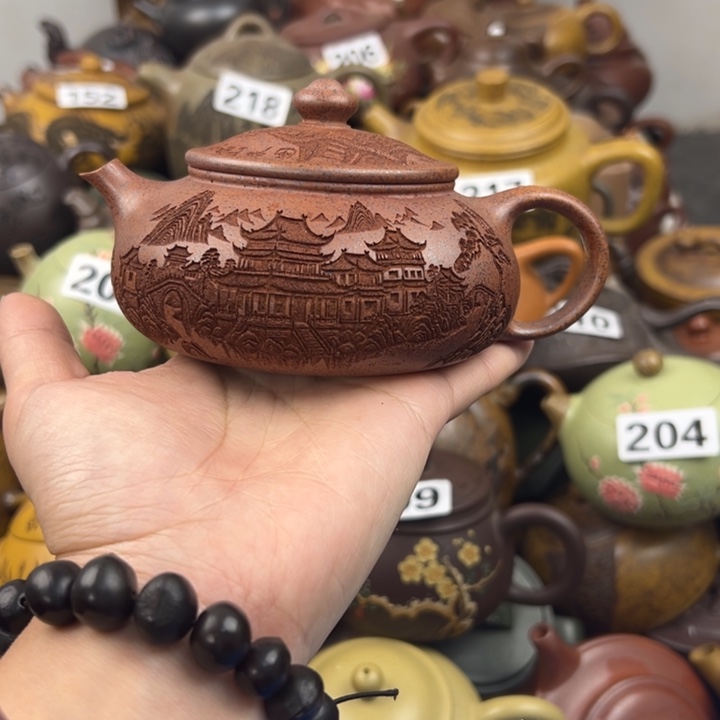 紫砂茶壶壶把磕碰