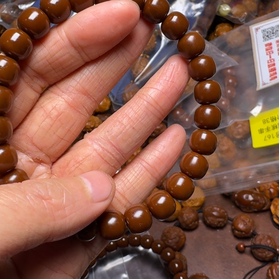 手串橄榄核你的电话