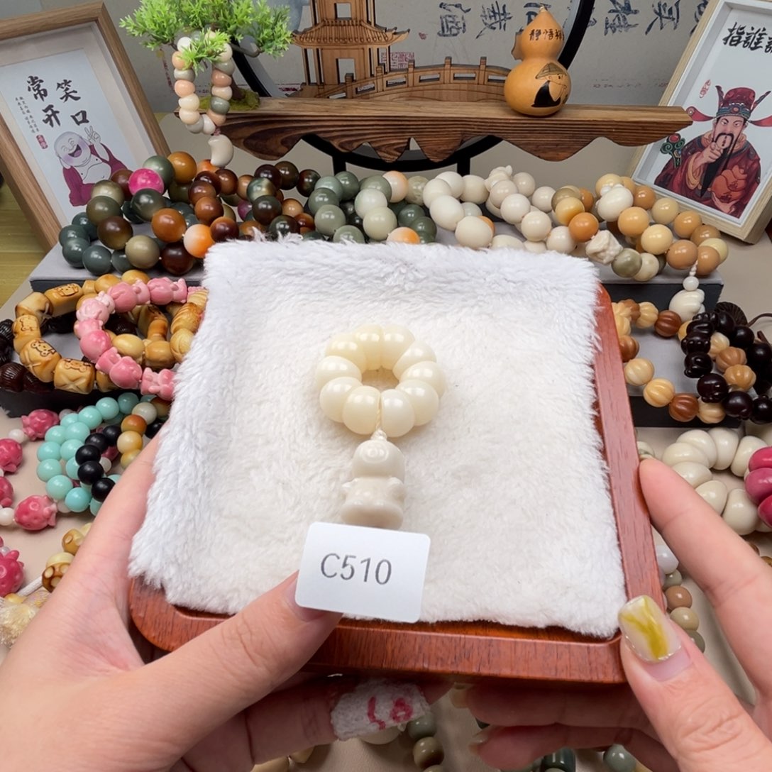 菩提根/象牙果手串是**呀白色山竹蒜瓣手捻