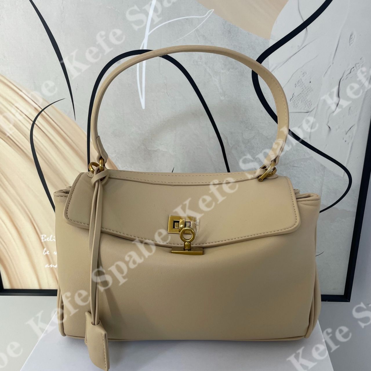 HM237  P25新款饼干色金扣小号redeo腋下手提斜挎包-1