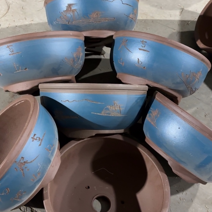 紫砂花盆100-7。    22.5-10.5