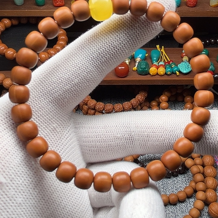 囍***财手串猴头核桃黑8文玩