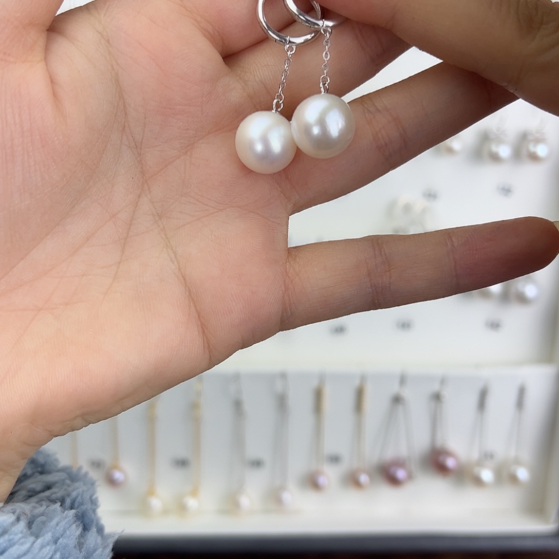 荧***荧银S925镶嵌淡水珍珠耳饰