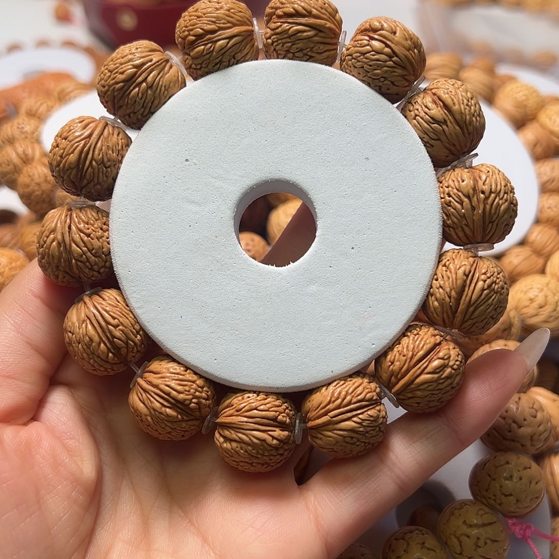 桃核吊坠龙鳞凤尾