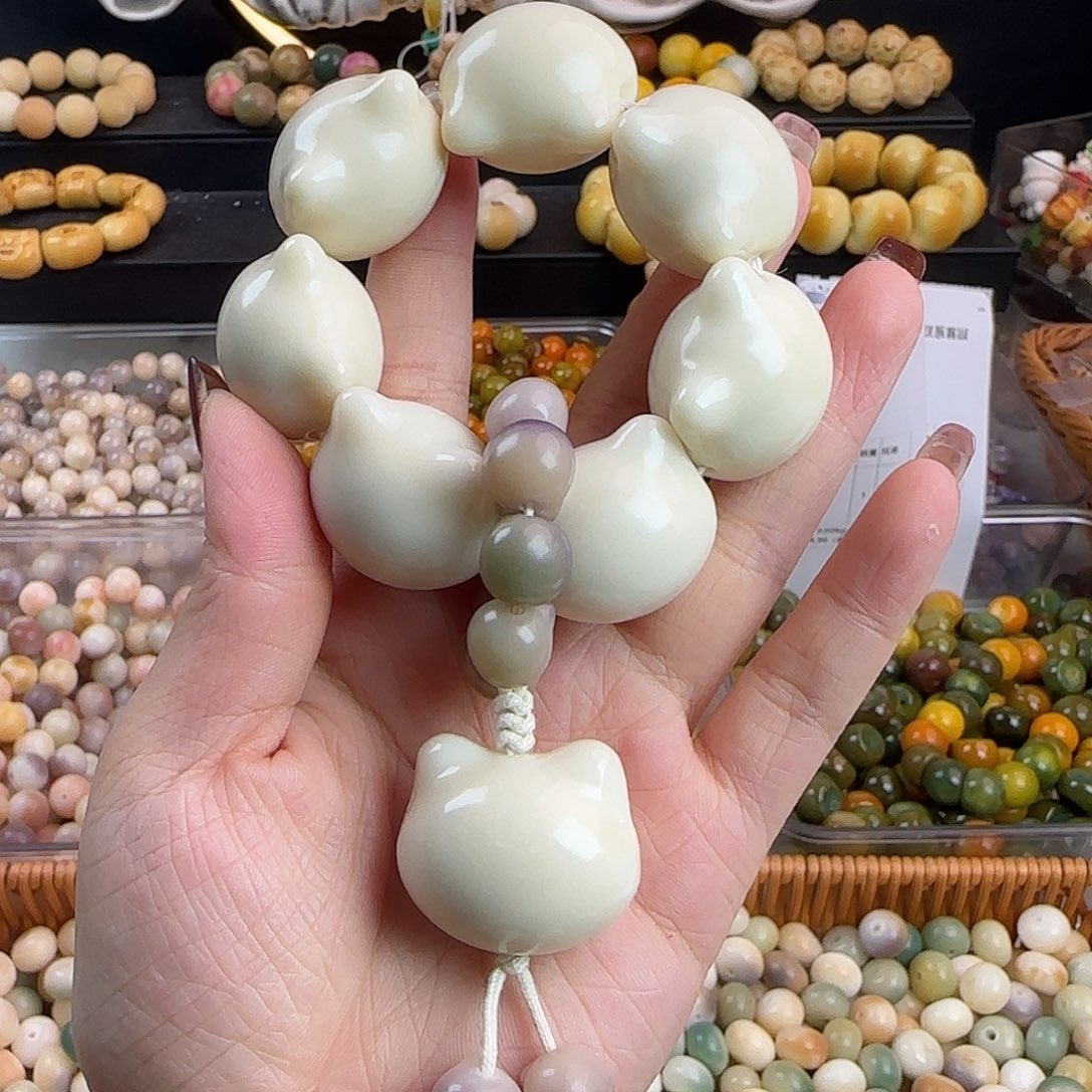 菩提根/象牙果手串微瑕牙果卡28猫头手捻1个