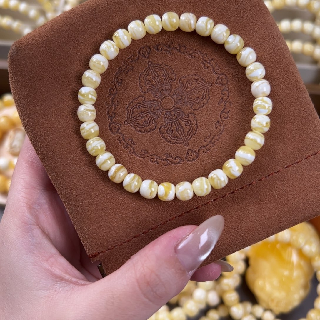 是***呢琥珀未镶嵌手串金瓷白虎皮7..2m