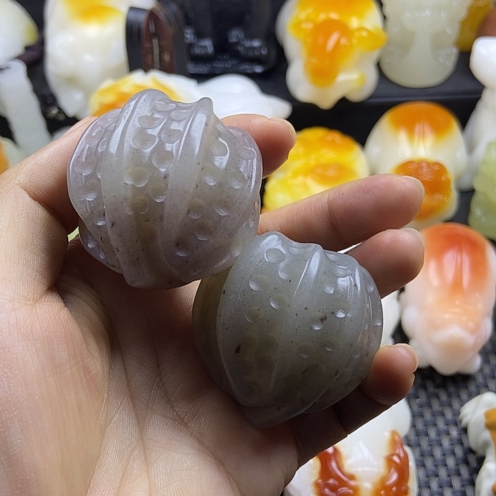 无花朵原石手把件