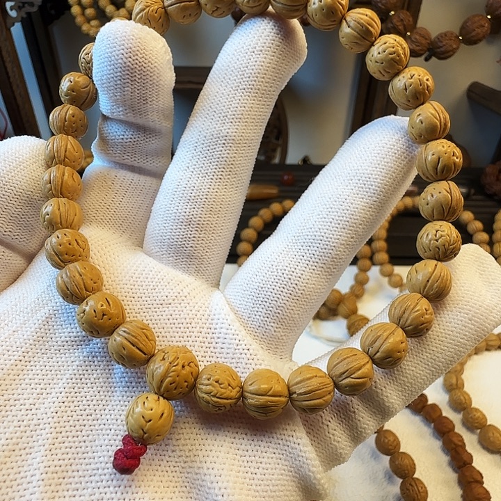 桉***逸吊坠桃核桃核手持