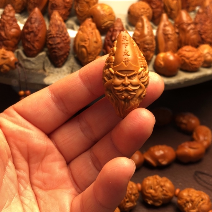 饭***困橄榄核吊坠橄榄核雕刻的单子