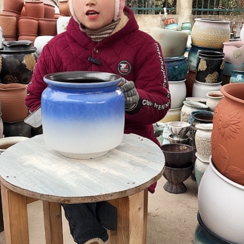 口21高22瑕疵盆子。 