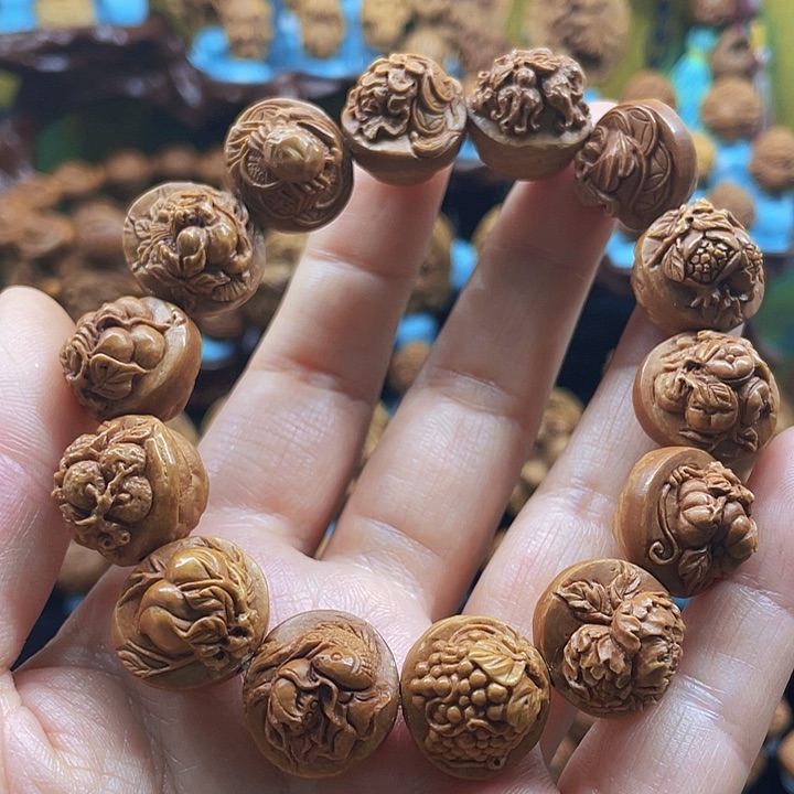 晓*龙纹桃核多宝串