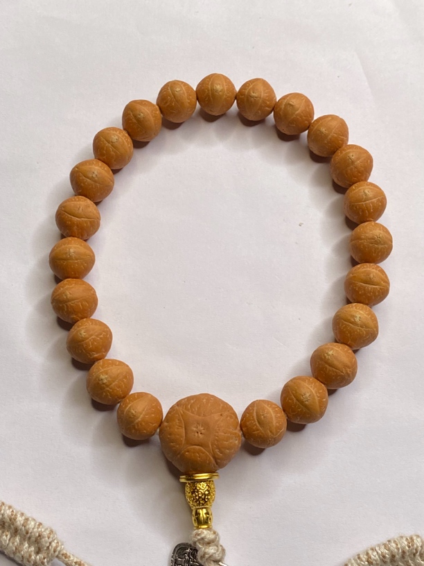 小凤眼手串，尺寸10.6，具体尺寸10.6一10.9姜黄皮，一物一图