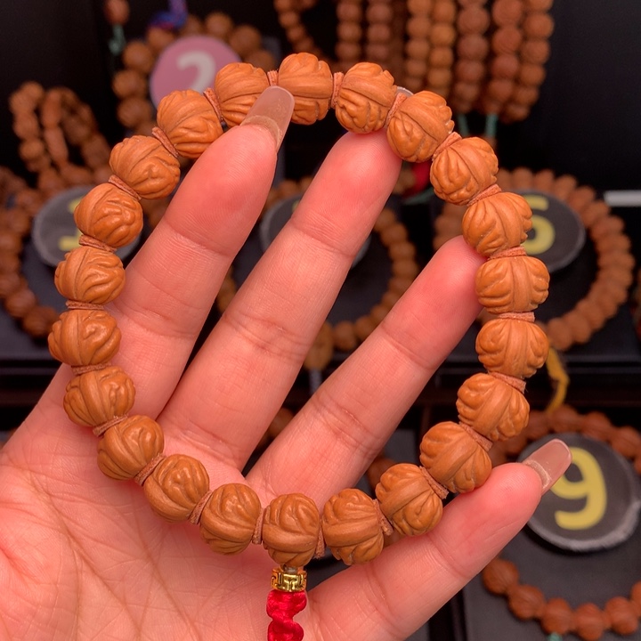 桃核吊坠1.5野生红莲手串