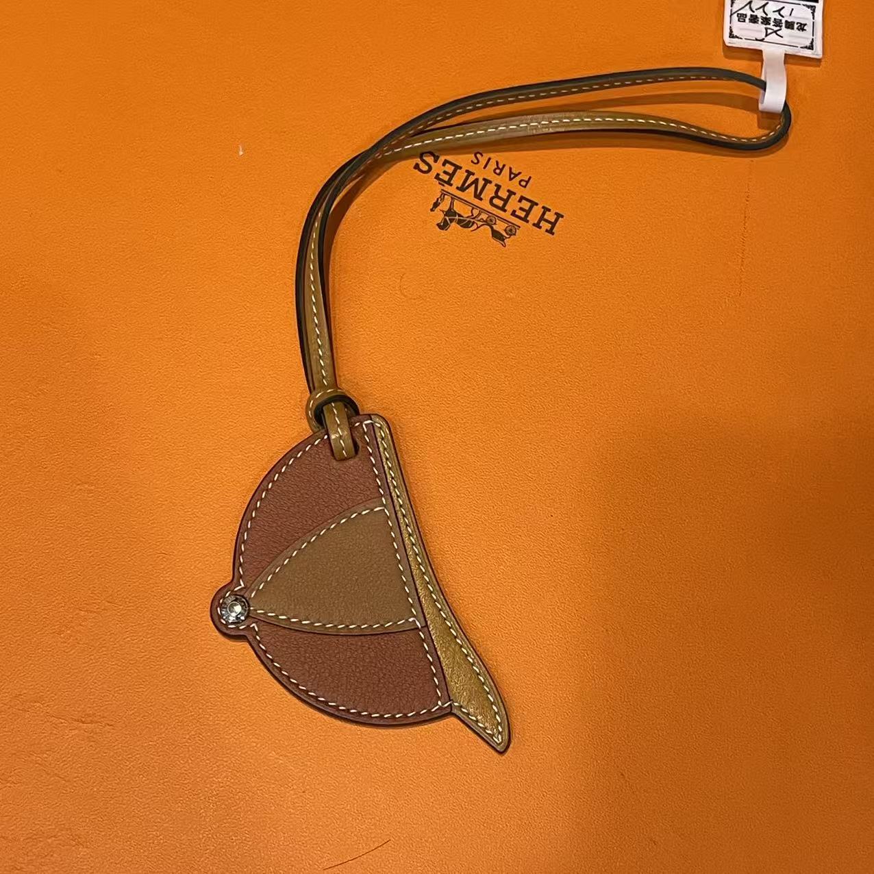 99新 LouisVuitton/路易威登 焦糖色帽子挂件 S160