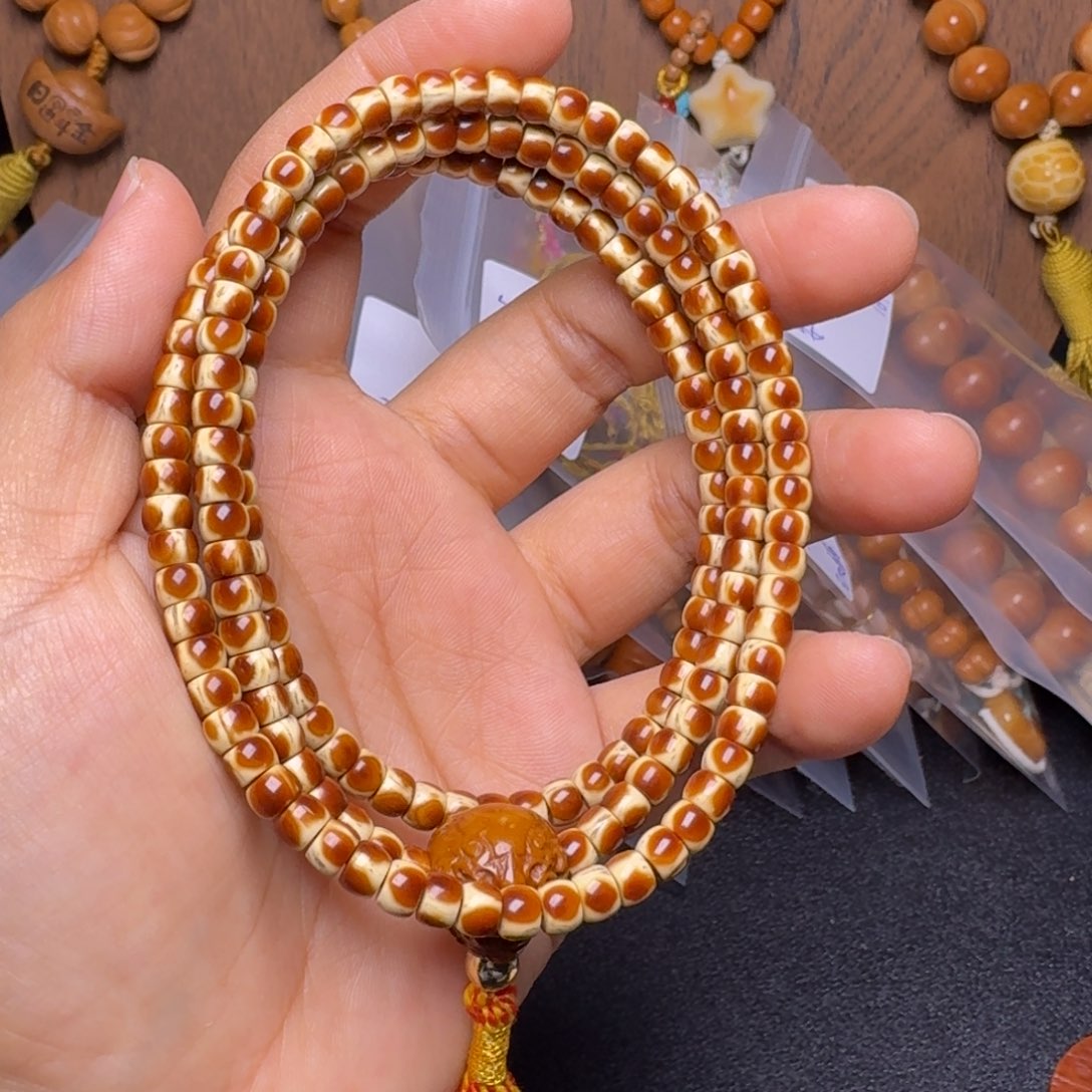 晓***猴头核桃吊坠顶级紫金鼠鼠尖