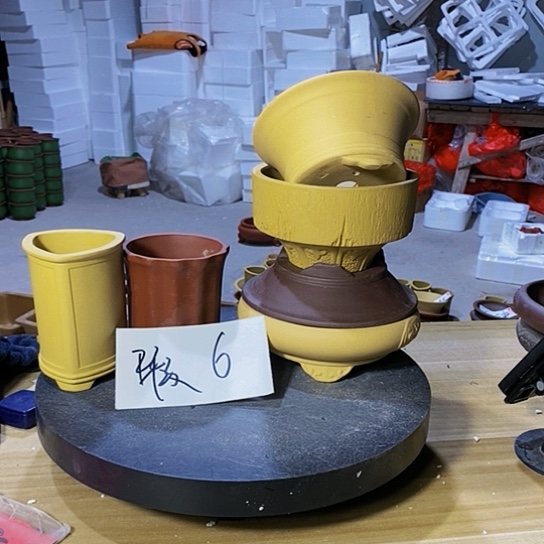 紫砂花盆修**n紫砂花盆