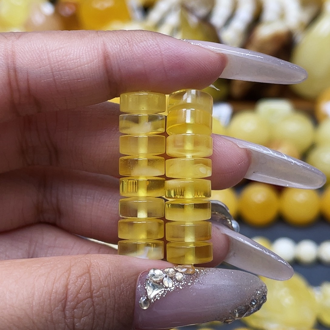 随***安蜜蜡未镶嵌裸石8.5mm隔片瑕