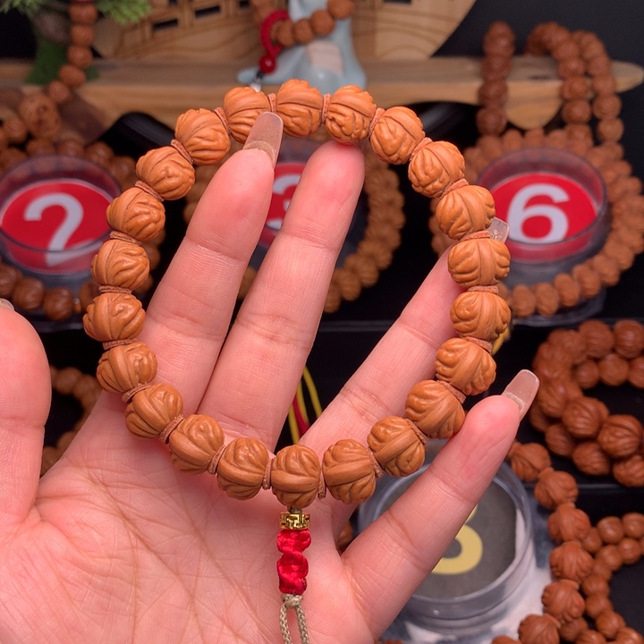 桃核吊坠1.3野生红莲手串