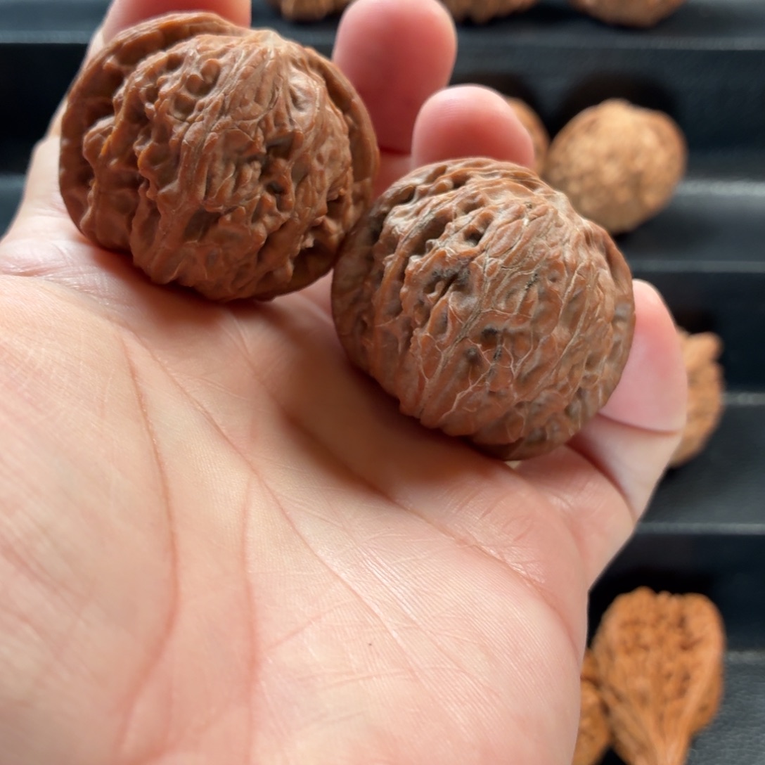 年***余桃核把件蓟县山地血磨42